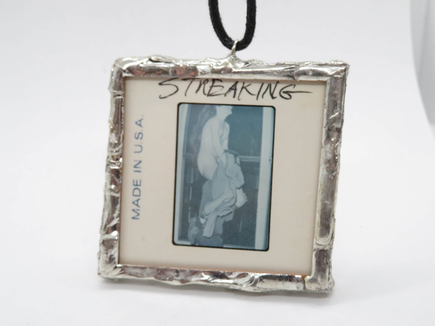 Slide Pendant of Nudist Couple