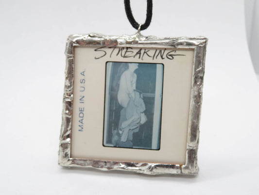 Slide Pendant of Nudist Couple