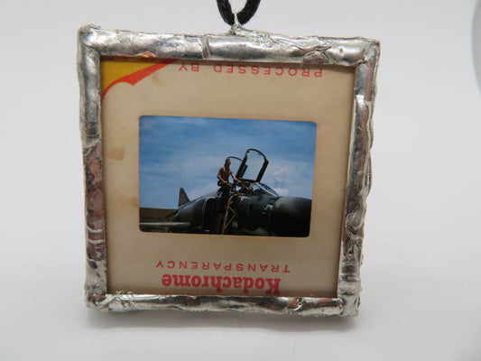 Slide Pendant of Vietnam Soldier Getting in Fighter Jet