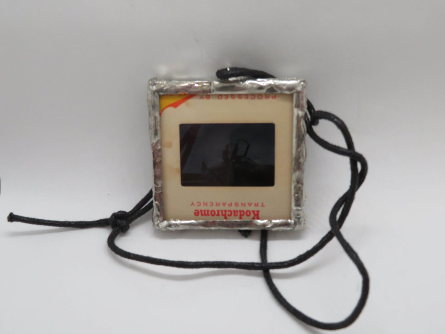 Slide Pendant of Vietnam Soldier Getting in Fighter Jet